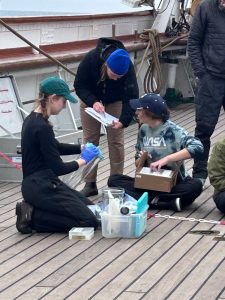 scientists measuring on the ship